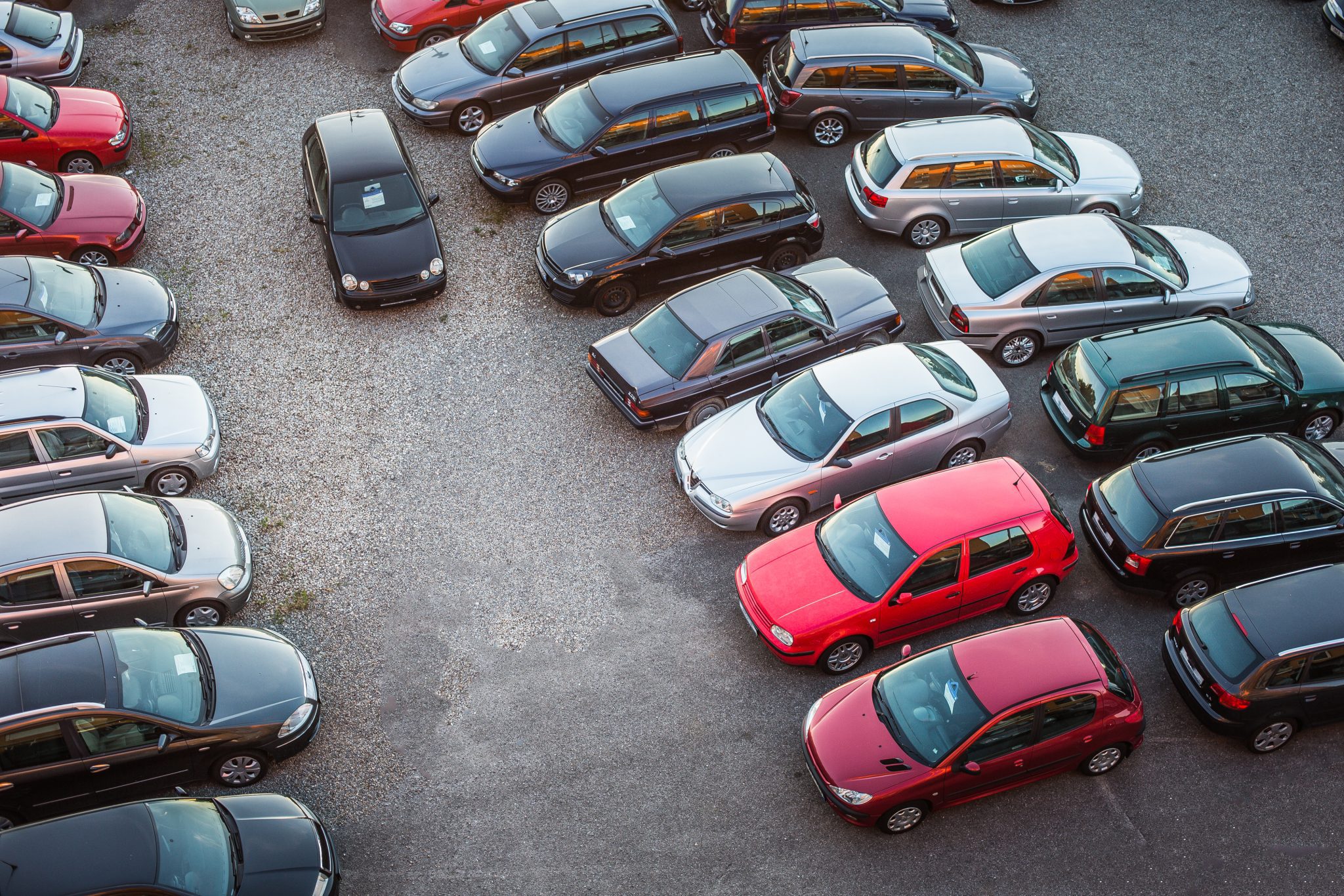 overhead shot of cars in a dealer lot