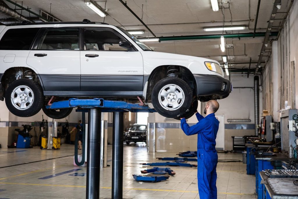 Mechanic servicing a vehicle