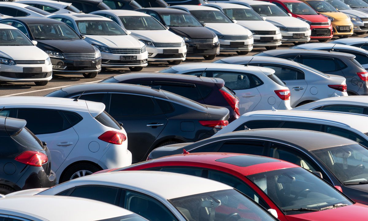 Image showing several cars with different colours on a dealer's lot