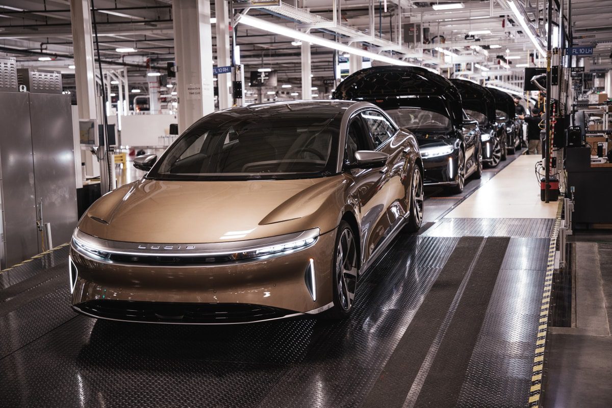 Image showing new Lucid Air EVs rolling off the assembly line.