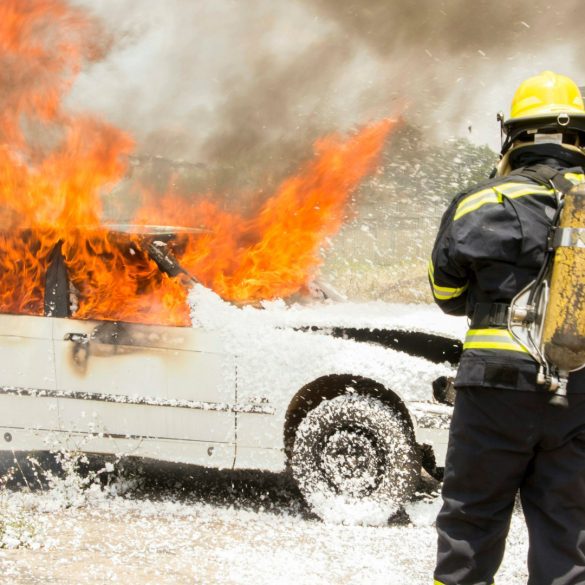 Firefighting putting out a car fire