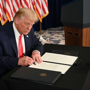 Trump signing an executive order